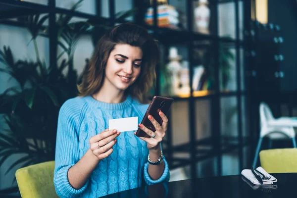 Cheerful Female Student Checking Number Business Card Holding Mobile Phone — Stock Photo, Image