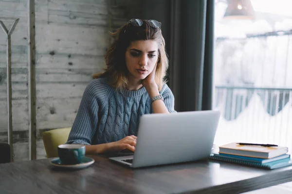 Serious Female Copywriter Watching Important Webinar Connected Wifi Using Laptop — Stock Photo, Image