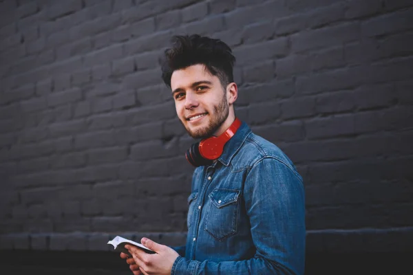 Portrait Cheerful Young Man Looking Camera Spending Time Street Holding — Stock Photo, Image