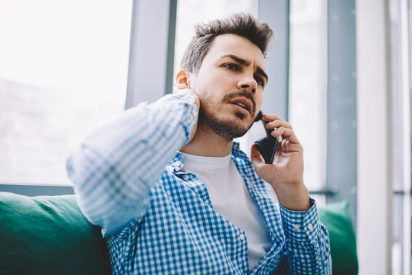 Puzzled Young Man Calling Customer Service Solving Problems Account Balance — Stock Photo, Image