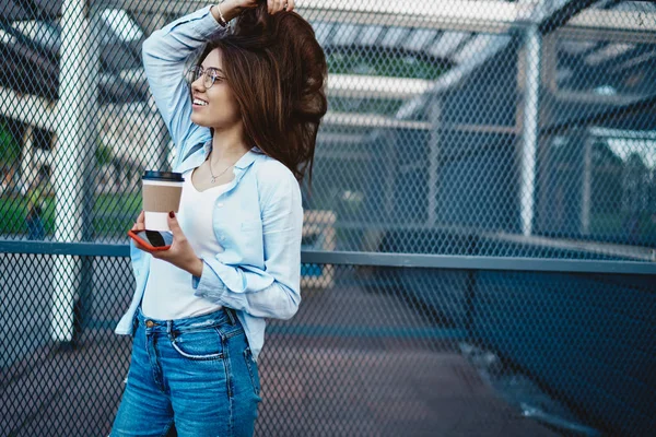 Charming Young Woman Gorgeous Hair Holding Tasty Coffee Smartphone Hands — Foto de Stock