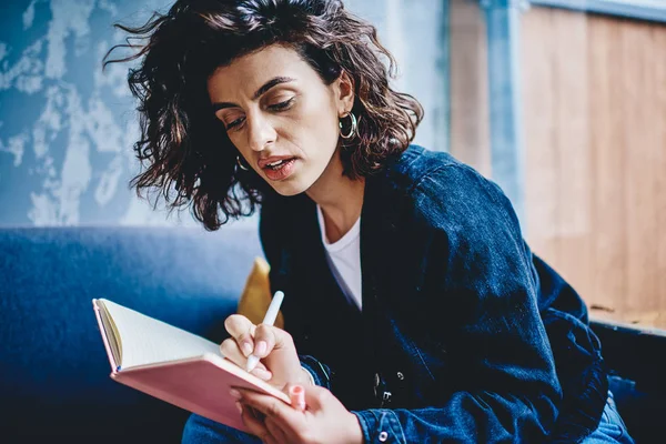 Pensive Attractive Young Woman Stylish Short Haircut Writing Checklist Notepad — Stock Photo, Image