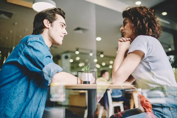 Young Serious Man Attentively Listening Girlfriend Date Modern Cafe Interior — Stock Photo, Image