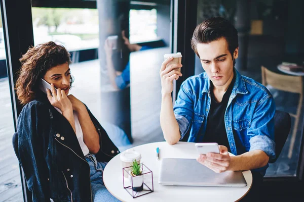 Caucasian Young Woman Calling Smartphone Device While Boyfriend Watching Video — Stock Photo, Image