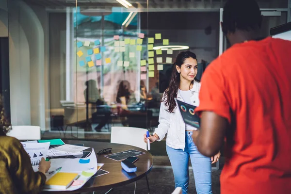 Young diverse colleagues working on project – stockfoto