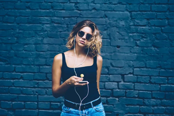 Portrait Charming Hipster Girl Trendy Sunglasses Looking Camera While Listening — Stock Photo, Image