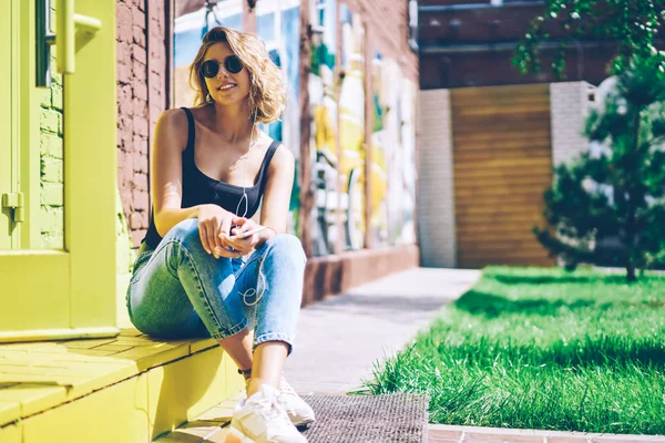 Portrait Happy Hipster Girl Dressed Denim Jeans Sitting Urban Setting — Stok Foto