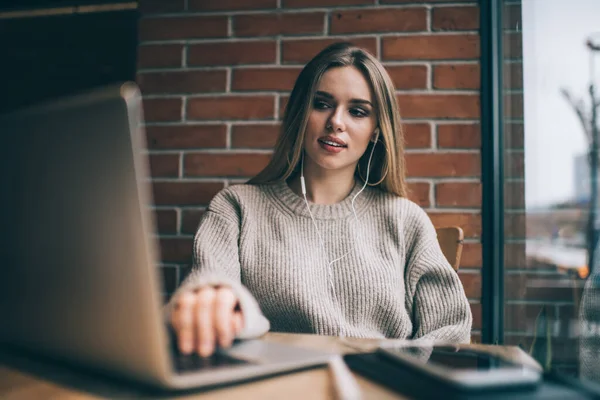 Young Serious Female Long Blond Hair Knitted Sweater Working Laptop — Stock Photo, Image