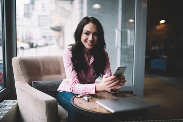 Happy Young Female Casual Outfit Sitting Small Table Comfortable Armchair — Stock Photo, Image