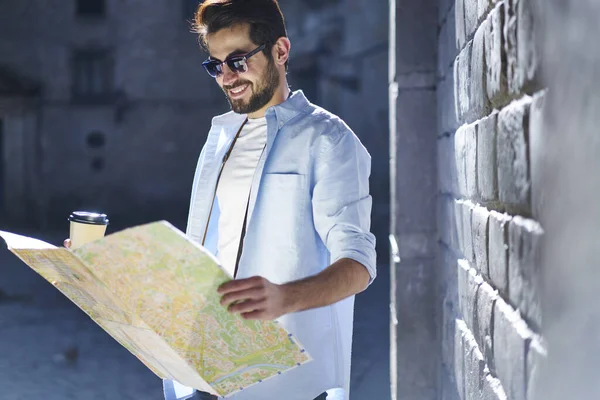 Happy Smiling Bearded Male Traveler Wearing Casual Outfit Examining Paper — Stock Photo, Image