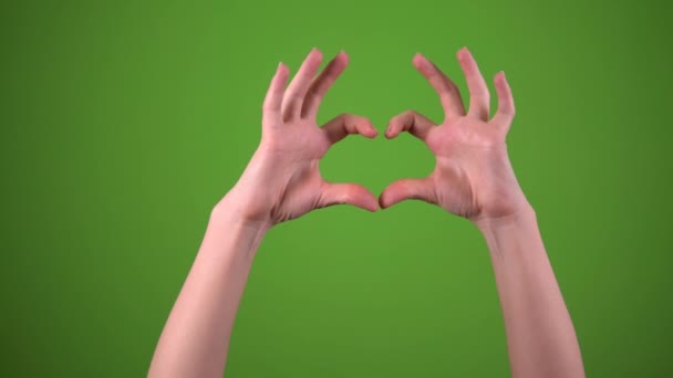 Hand zeigt Herz, Liebe auf grünem Bildschirm — Stockvideo
