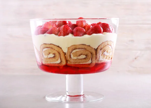 Layered sweet dessert trifle cake with strawberry