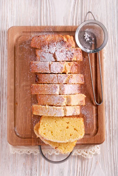 Pound Cake Icing Sugar Sliced Wooden Board — Stock Photo, Image