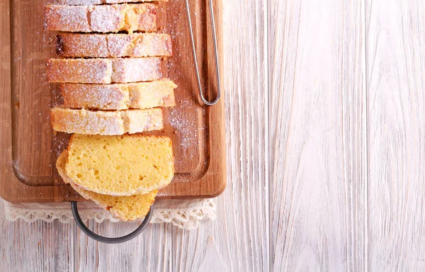 Pound Cake Icing Sugar Sliced Wooden Board — Stock Photo, Image