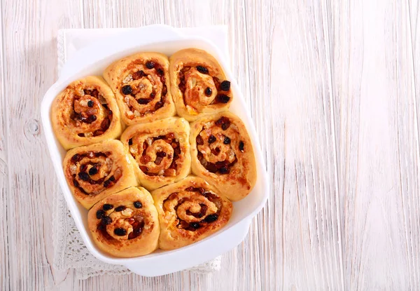 Chelsea buns - sweet rolls in baking tin