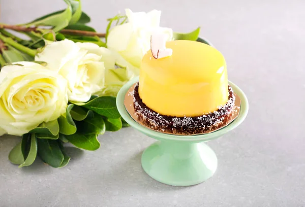 Soft tropic mousse cake with yellow mirror glaze