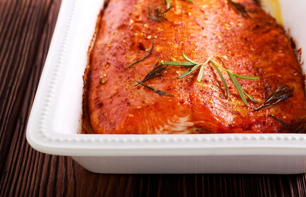 Baked rosemary trout fillet in a tin