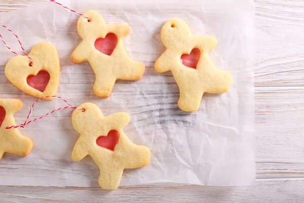 Galletas Vidrio Manchado Sobre Papel Blanco Sobre Mesa Madera — Foto de Stock