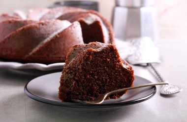 Mocha and rum ring cake on plate