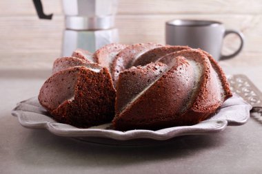 Mocha and rum ring cake on plate