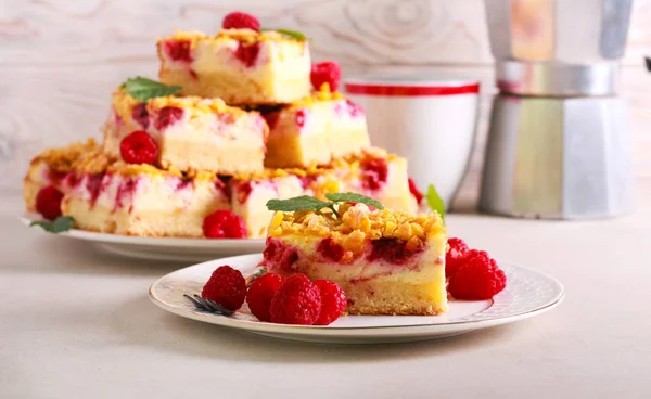 Raspberry cheesecake bars slices served — Stock Photo, Image