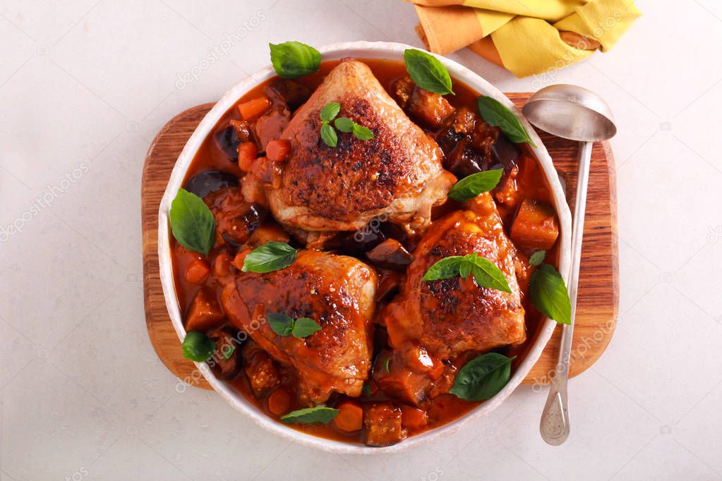 Chicken thighs with eggplant and carrot 