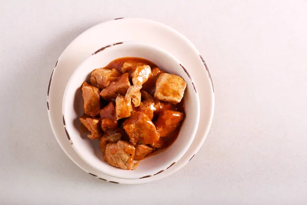 Pork bites in gravy - stew — Stock Photo, Image