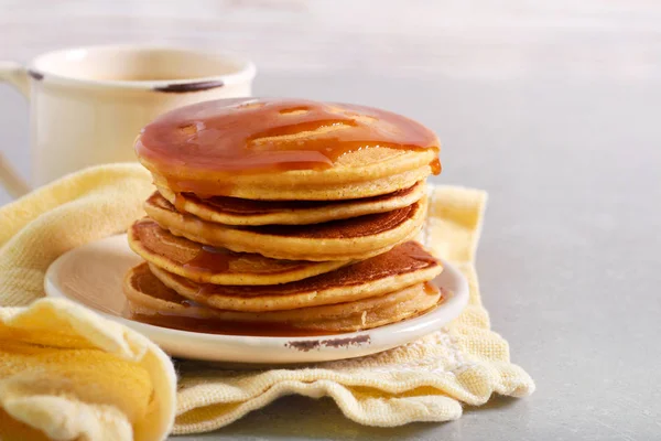 Pumpkin pancake stack with caramel sauce — Stock Photo, Image
