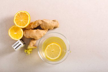 Lemon and ginger detox healthy tea, served clipart