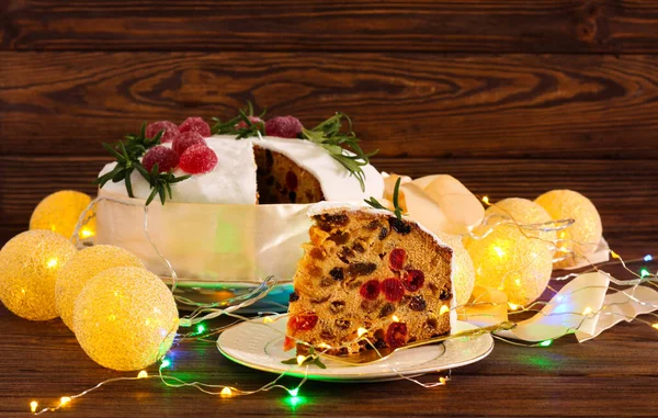 Christmas Fruit Cake Wooden Background Lights — Stock Photo, Image