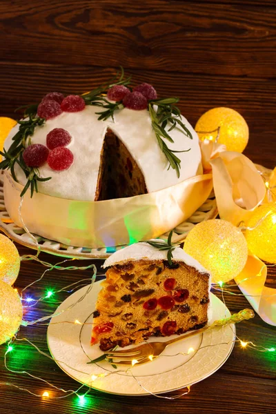 Christmas Fruit Cake Wooden Background Lights — Stock Photo, Image