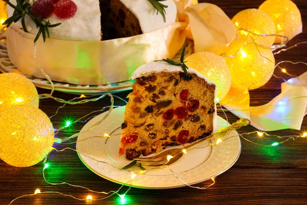 Christmas Fruit Cake Wooden Background Lights — Stock Photo, Image