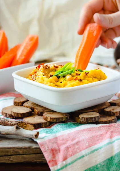 Classic Hummus Herbs Olive Oil Ceramic Bowl Served Carrot Sticks — Stock Photo, Image