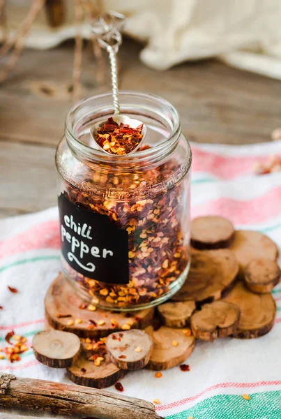 Ground Dried Chili Pepper Spilled Glass Can Inscription Crushed Chillies — Stock Photo, Image