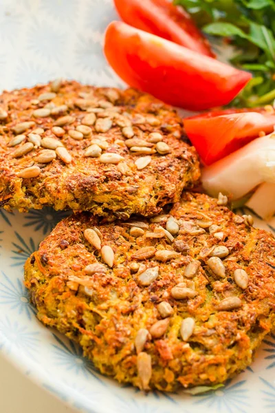 Baked vegan burgers with beans and seeds, vegetables and herbs. — Stock Photo, Image