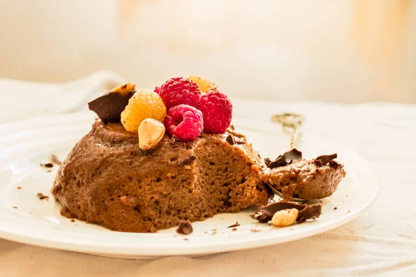 Chocolate mousse with raspberries.The process of eating.Holiday — Stock Photo, Image
