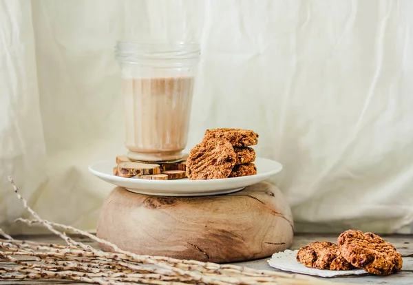 Oat and peanut butter cookies with a glass of  non-diary hemp mi — Stock Photo, Image