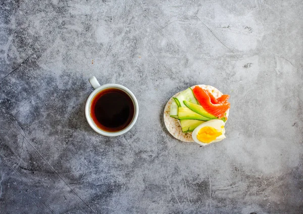 Gluten-free toast with avocado and fresh salted salmon, eggs and — Stock Photo, Image
