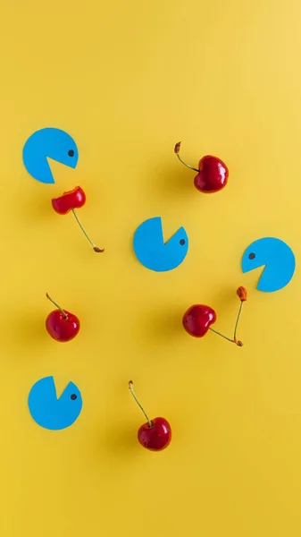 Blue Figures Trying Eat Cherries — Stock Photo, Image