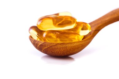 D vitamini ve Omega 3 balık yağı kapsülleri ek iyi beyin, kalp ve sağlık yarar yemek için kapatın