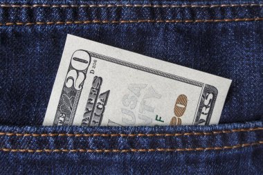 bir kot pantolon cebinde Amerikan Doları