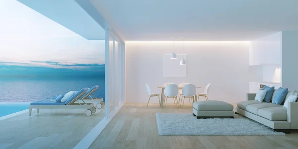 Interior of a villa with a swimming pool. House overlooking the sea. Night. Evening lighting. 3D rendering.