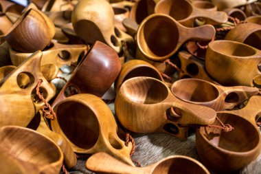 A Group Of Guksi Or Kuksa Drinking Cups Hand Crafted From Carved Birch Burl By The Sami People Of Finland In Lapland Northern Scandinavia . Selective Focus clipart