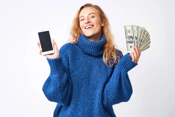 Young Joyful Blonde Blue Sweater White Background Dollars Money Mobile — Stock Photo, Image
