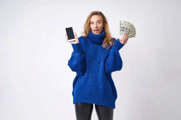 Surprised Young Woman Blonde Blue Sweater White Background Telephone Dollars — Stock Photo, Image