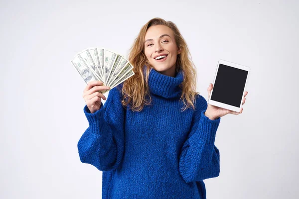 Joyful Woman Blue Sweater White Background Money Tablet — Stock Photo, Image