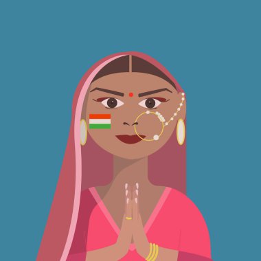 Hindistan 'ın bağımsızlık günü için Sari şenliğinde bir Hintli kadının portresi. Hintli bir kadının yüzüne Hindistan Bayrağı boyanmış.