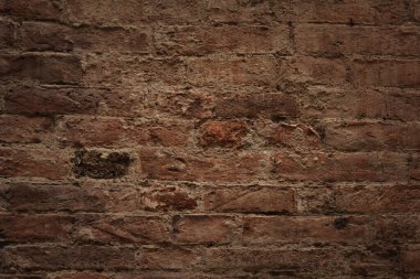 Eski tuğla duvar, kırmızı taş blokların eski dokusu.