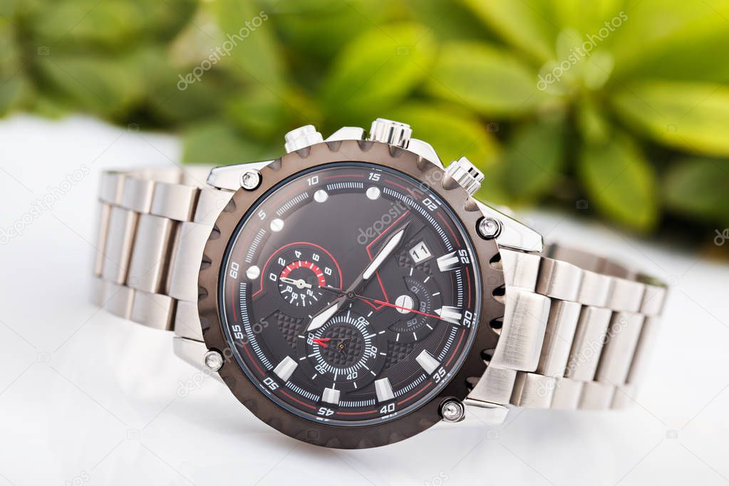 Elegant business men fashion wrist watch with metal bracelet.