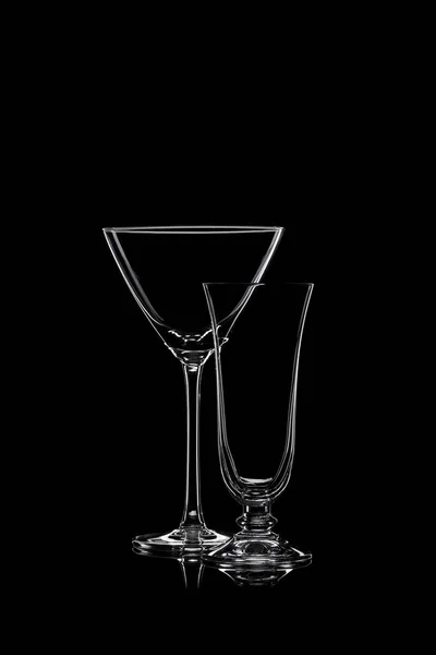 Glassware silhouettes on black. — Stock Photo, Image